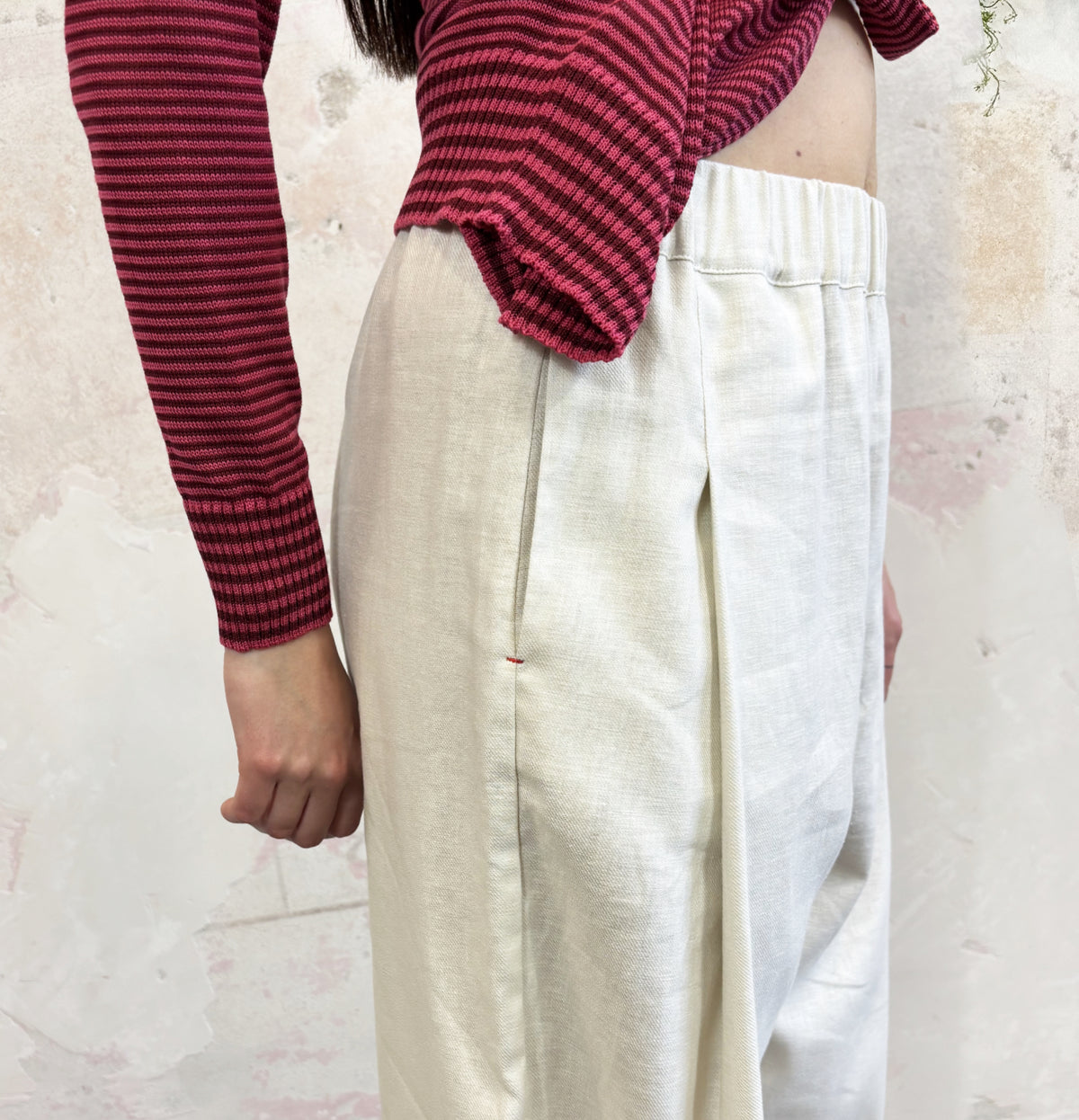 Pantalone con piega